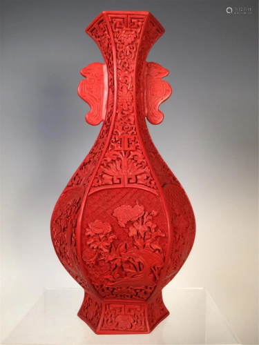 A CARVED RED LACQUER HEXAGONAL VASE