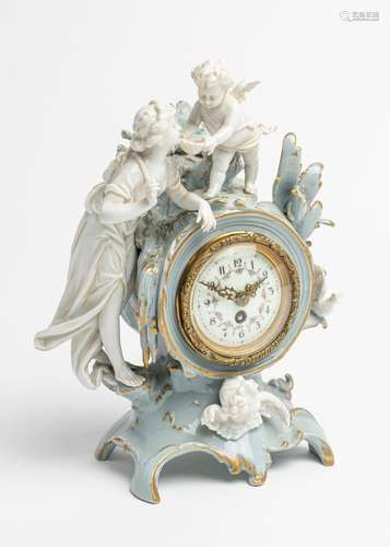 A German porcelain mantel clock, 8 1/2 in. (21 cm)