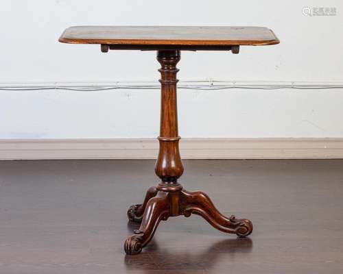 A mahogany rectangular tilt top occasional pedestal table, 2...