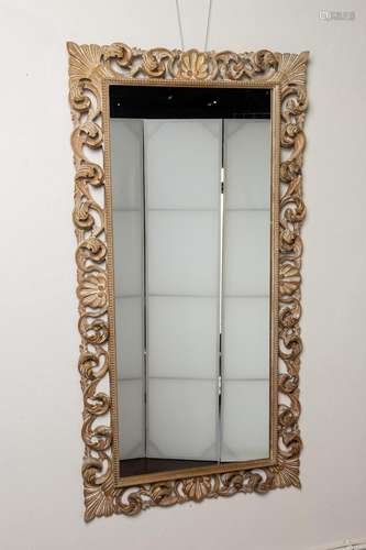 A rectangular wall mirror, 28 x 53 1/2 in. (71.1 x 135.8 cm)