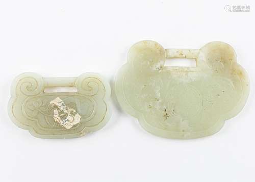 Two Chinese celadon jadeite pendants of ruyi form,