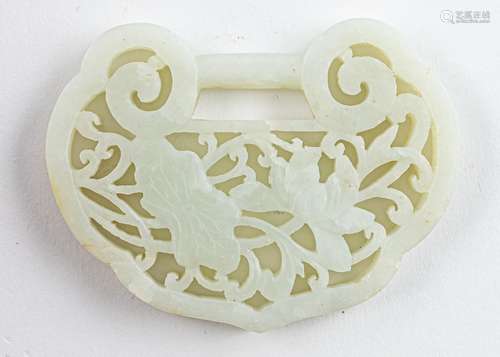 A Chinese light celadon jadeite pendant of ruyi form,