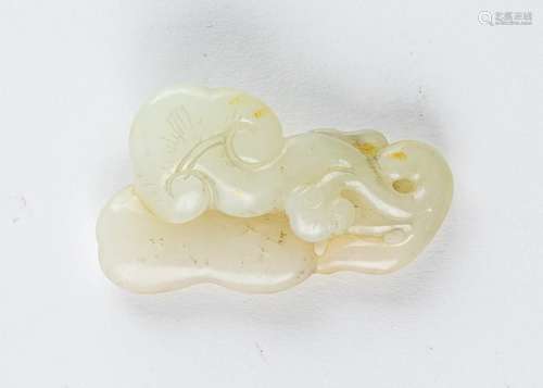 A russet and white jadeite carving of fungus. 2 1/2 in. (6.3...