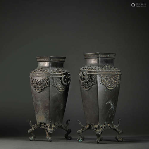 A set of Copper Showing Vase with Two Ears and four Foot fro...