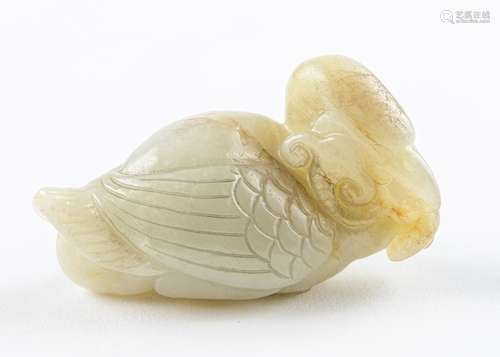 A russet and celadon jadeite carving of a swan. 1 1/2 x 2 3/...