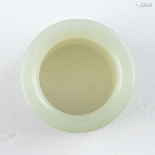 A Chinese celadon jadeite ring. 1 1/8 x 1 3/8 in. (3 x 3.5 c...