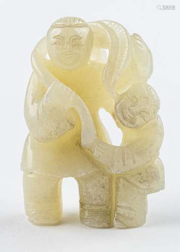 A Chinese celadon jadeite figure group of a father and son h...