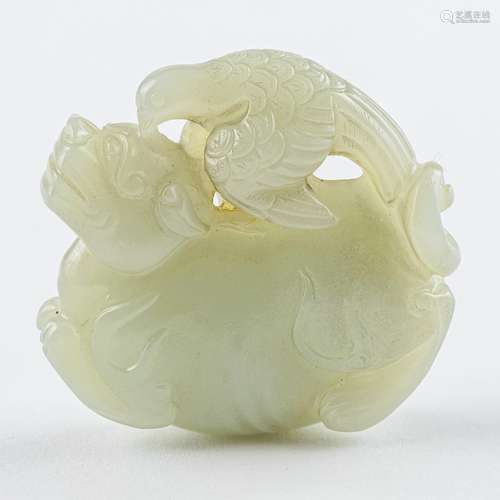 A celadon jadeite carving of a pigeon,