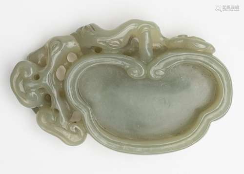 A Chinese celadon jadeite water dipper, 3 1/2 in. (9 cm)