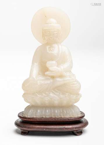 A Chinese jadeite figure, 3 1/4 in. (8 cm) h.