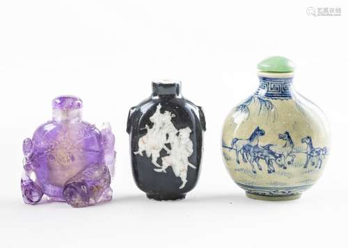 Three Chinese snuff bottles.