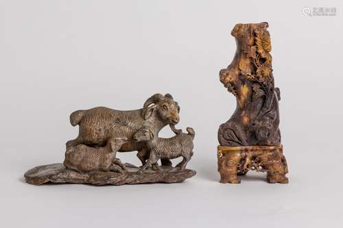 A carved stone figure of three goats, 9 in. (23 cm); 8 1/2 i...