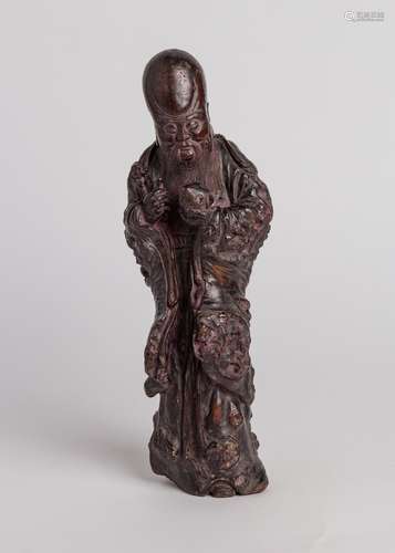 An antique carved wood figure of Shou Lao, 14 1/2 in. (37 cm...