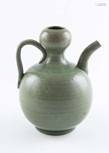 A Korean celadon glazed gourd form pitcher. 6 3/4 in. (17 cm...