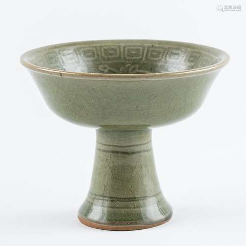 A celadon glazed stem cup, 3 1/2 x 4 1/4 in. (9 x 11 cm)