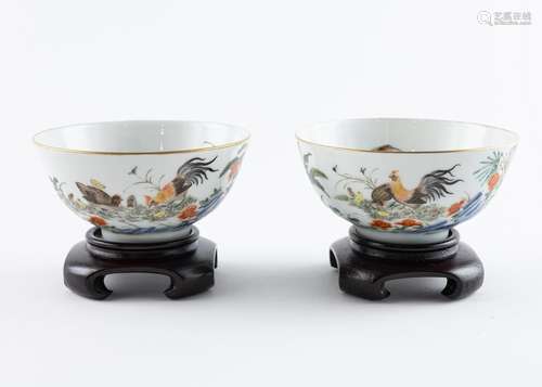 A pair of famille rose chicken bowls, 2 1/4 x 4 1/2 in. (5.7...