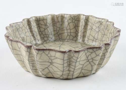 A Chinese crackle glazed porcelain bowl, 1 1/2 x 4 3/4 in. (...