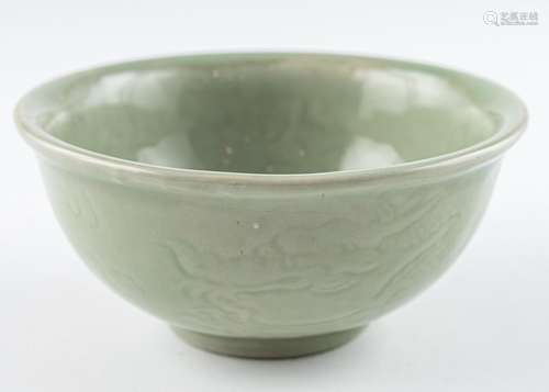 A Chinese celadon glazed deep bowl, 2 3/4 x 6 in. (7 x 15cm)