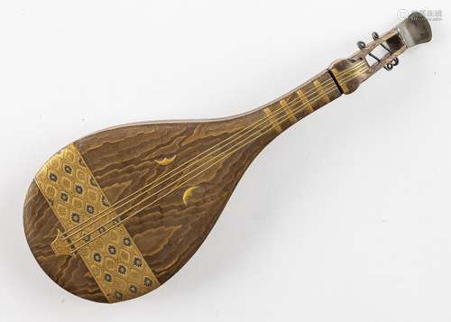 A fine Japanese gilt and lacquered box in the form of a lute...