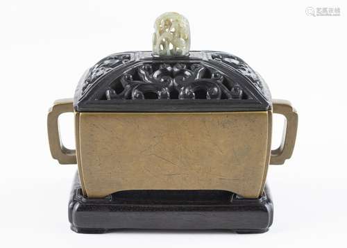 A Chinese brass incense burner with handles,