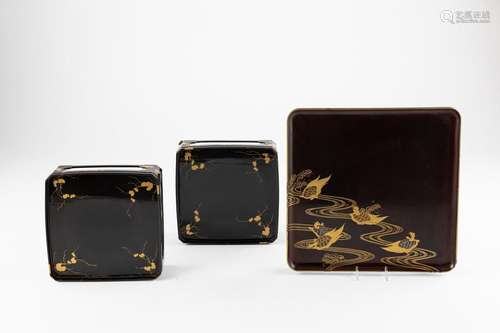 A pair of Japanese black lacquer and gilt rectangular stands...