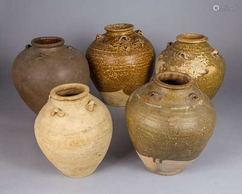 Five Ming pottery 'Talking' jars,