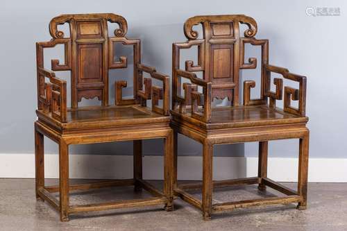 A pair of Chinese hardwood armchairs,