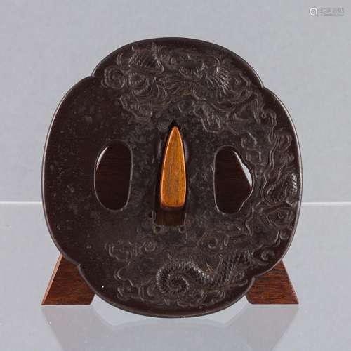 An 18th century Japanese iron tsuba, 3 x 2 3/4 in. (7.6 x 7 ...