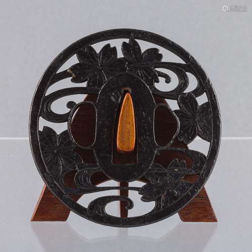 An 18th century Japanese iron tsuba, 2 7/8 x 2 3/4 in. (7.3 ...