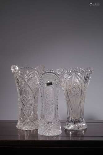 a group of three chinese glass flower vases