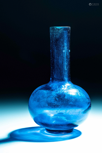 A Chinese Transparent Peacock-Blue Glass Bottle Vase