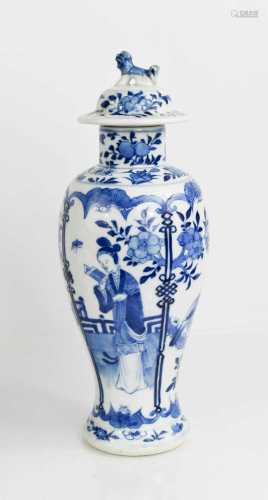 A 19th century Chinese blue and white baluster vase and cove...