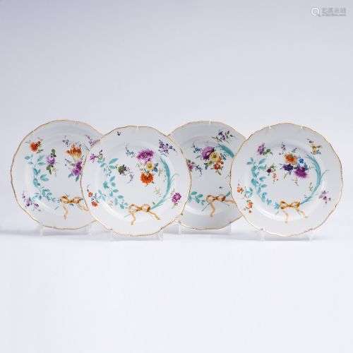 A Set of 4 Plates with Flowers and Garlands.