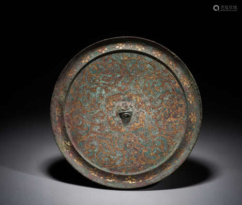 In Han Dynasty, China,  gold, silver and bronze mirrors