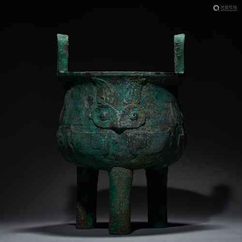 Ancient Chinese bronze animal-faced tripod