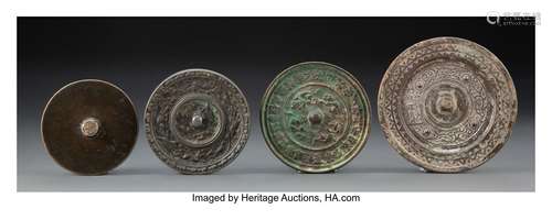 A Group of Four Chinese Bronze Mirrors 0-1/2 x 4-1/4 inches ...