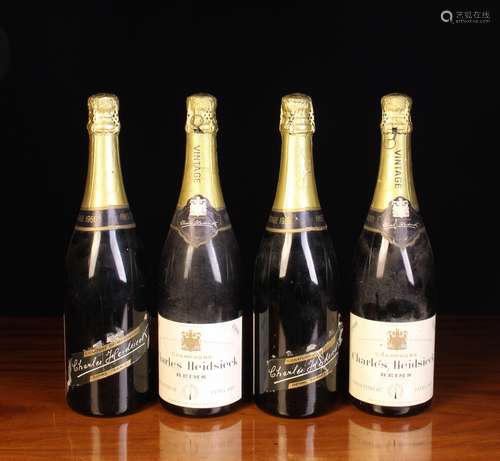 Four Bottles of 1966 Vintage Finest Quality Extra Dry Champa...