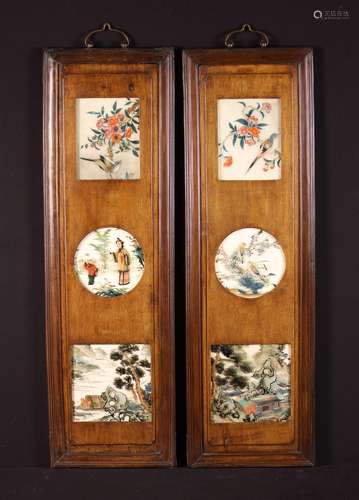 A Pair of Chinese Moulded Wooden Panels decorated with paint...