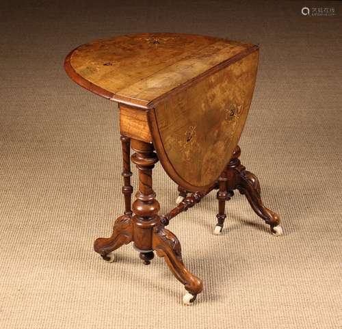 A Small Victorian Figured Walnut Sutherland Table.