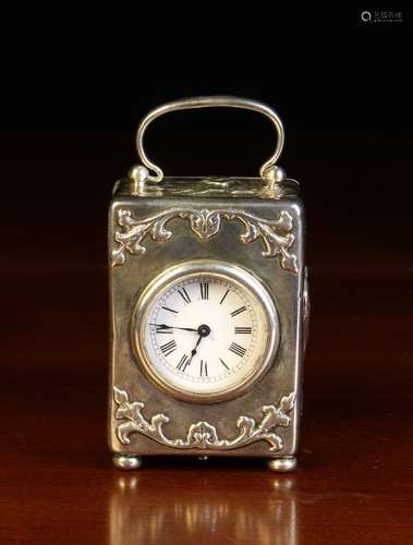 A Miniature Silver Cased Clock by William Comyns hallmarked ...