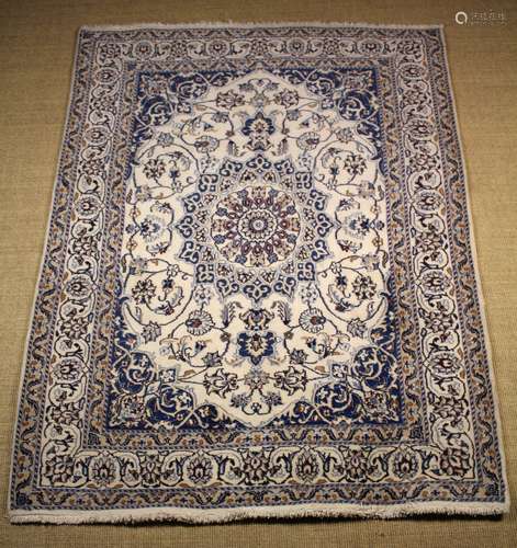 An Iranian Wool Carved woven in with floral designs predomin...