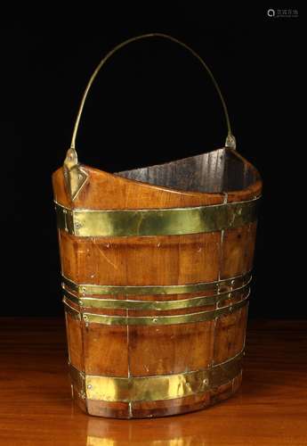 An Early 19th Century Navette Form Peat Bucket with brass bo...