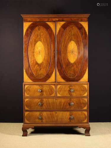 An Attractive 19th Century Mahogany Linen Press enriched wit...