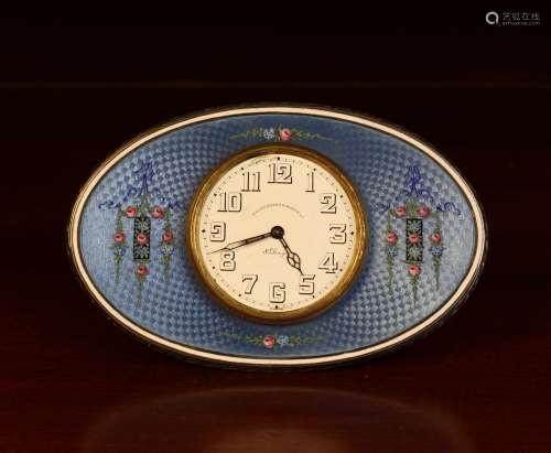 An Art Deco Sterling Silver & Enamel 8 Day Strut Clock, reta...