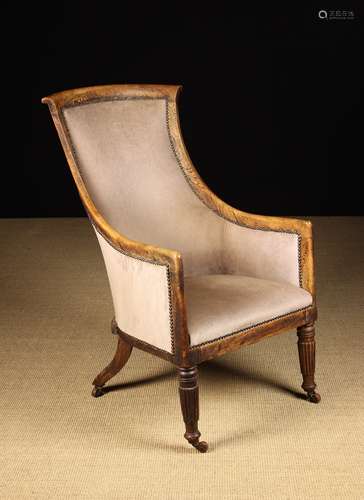 A Regency Upholstered Bergère Armchair in a beechwood frame ...