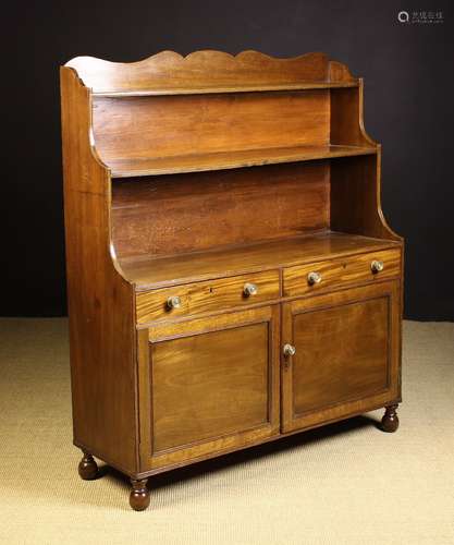 A Fine Early 19th Century Mahogany Waterfall Bookcase.