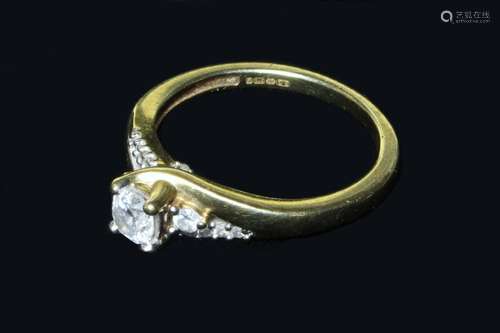 A 9 Carat Gold Lady's Ring set with a square diamond approx ...