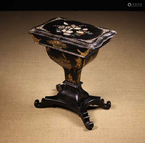 A Victorian Black Lacquered Papier-mâché Work Table.