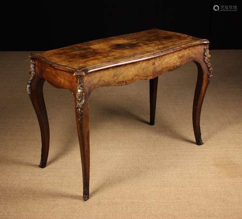 A Victorian Figured Walnut Centre Table.