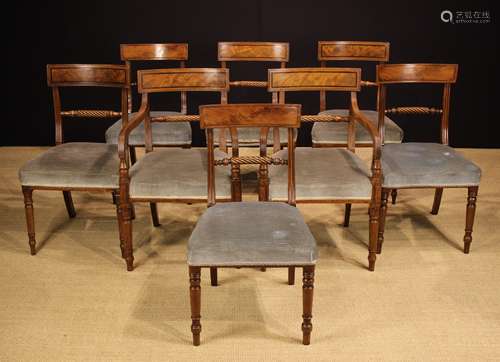 A Harlequin Set of Eight George IV Mahogany Dining Chairs in...